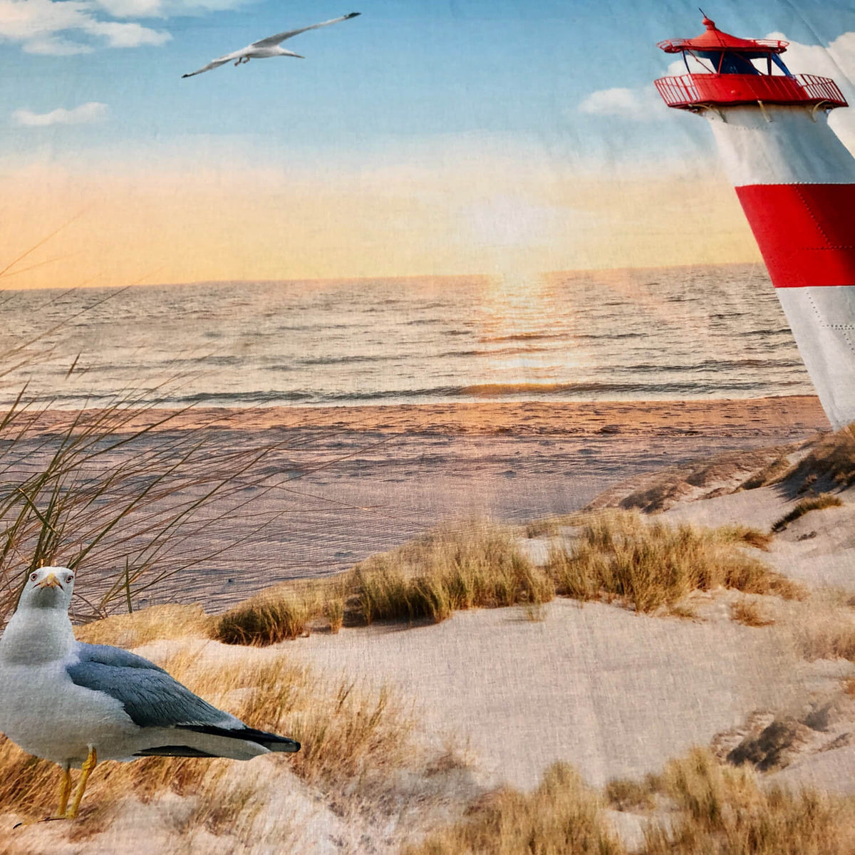 leuchtturm strand bettwaesche sonnenuntergang